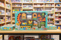 Toy train set packaging on a shelf in a toy store