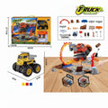 Toy truck set with packaging, toy truck, and accessories on a wooden surface.