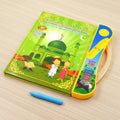 Children's educational book with electronic pen on a wooden surface