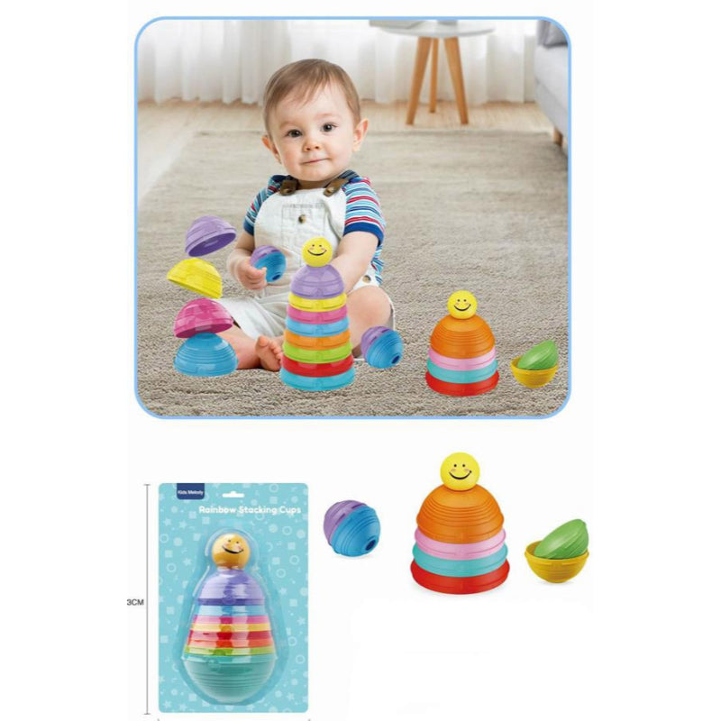 Baby playing with colorful stacking toys on a carpeted floor.