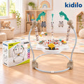 A Kidilo Jump baby jump mat with a white base, gray curved frame, and colorful animal and vehicle toys hanging from the arch, shown in a bright nursery setting next to its product box.