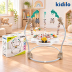 A Kidilo Jump baby jump mat with a white base, gray curved frame, and colorful animal and vehicle toys hanging from the arch, shown in a bright nursery setting next to its product box.