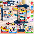 Car Ramp Racer toy set shown with its retail box, assembled multi-level ramp track, several small racing cars, and feature callout graphics on a beige carpeted floor. The packaging and graphics mention visual skills, hand-eye coordination, logical thinking, imagination, and parent-child interaction.