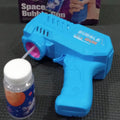 Blue bubble gun with a bottle of bubble solution on a textured surface