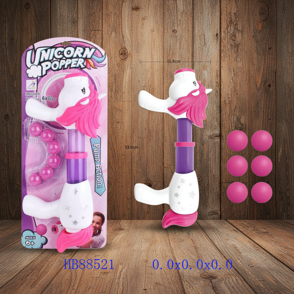 Unicorn popper toy with packaging on a wooden background