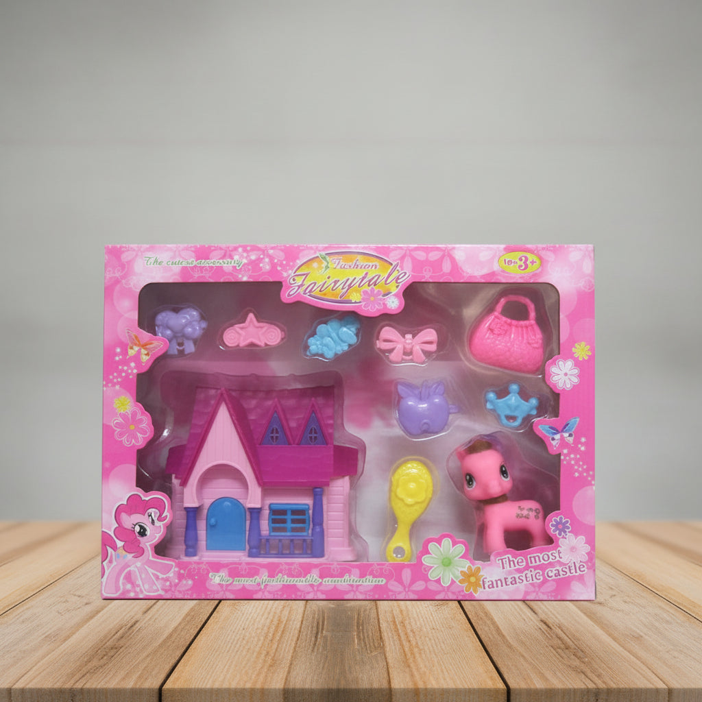 Toy set packaging with a pink fairy tale house and characters on a wooden surface.