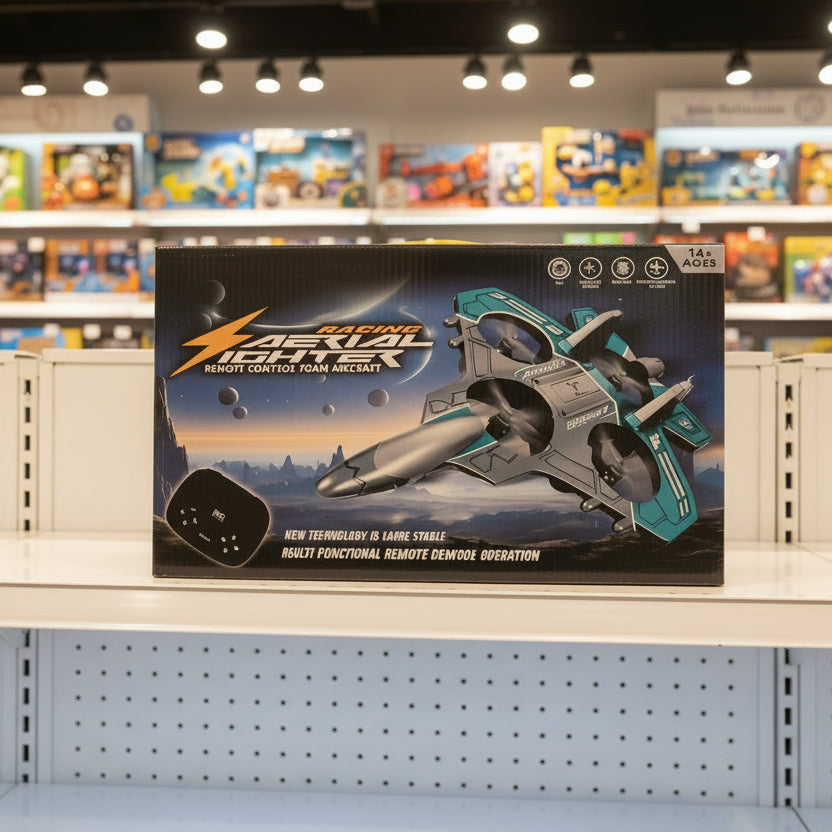 A boxed toy product labeled Space Command Rocket Controller stands on a retail shelf. The box shows a gray and teal rocket ship, a black remote control, and toy packaging graphics, with a blurred toy store interior in the background.