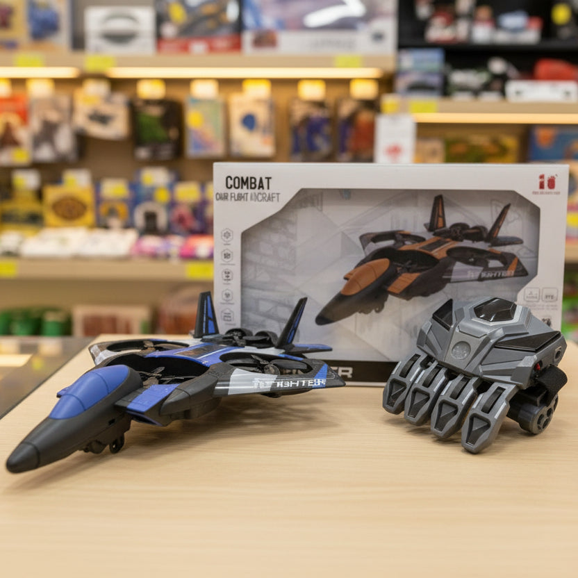 A toy combat dart gun flying craft set displayed on a wooden table in a toy store, featuring a blue and black dart gun, a gray multi-pronged dart gun, and its original product packaging box in the background.