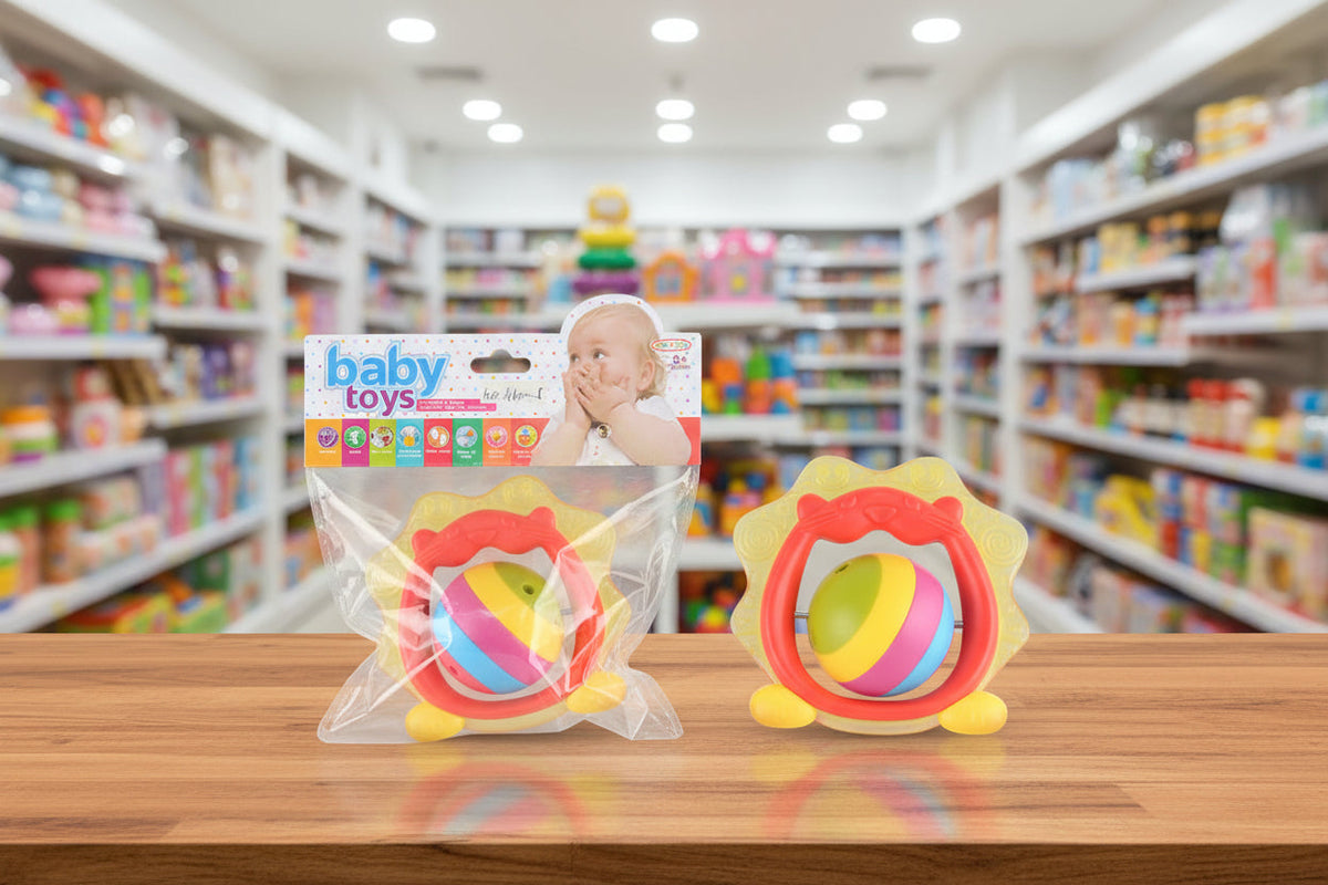 Colorful baby toys on a wooden table with a store shelf in the background