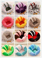Collection of colorful baby seats with various patterns on a white background