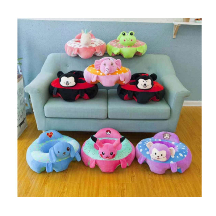 Colorful animal-shaped cushions on a light blue sofa and floor.