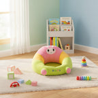 Colorful baby seat in a child's room with toys and books.
