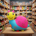 Colorful toy caterpillar on a wooden table with shelves of toys in the background