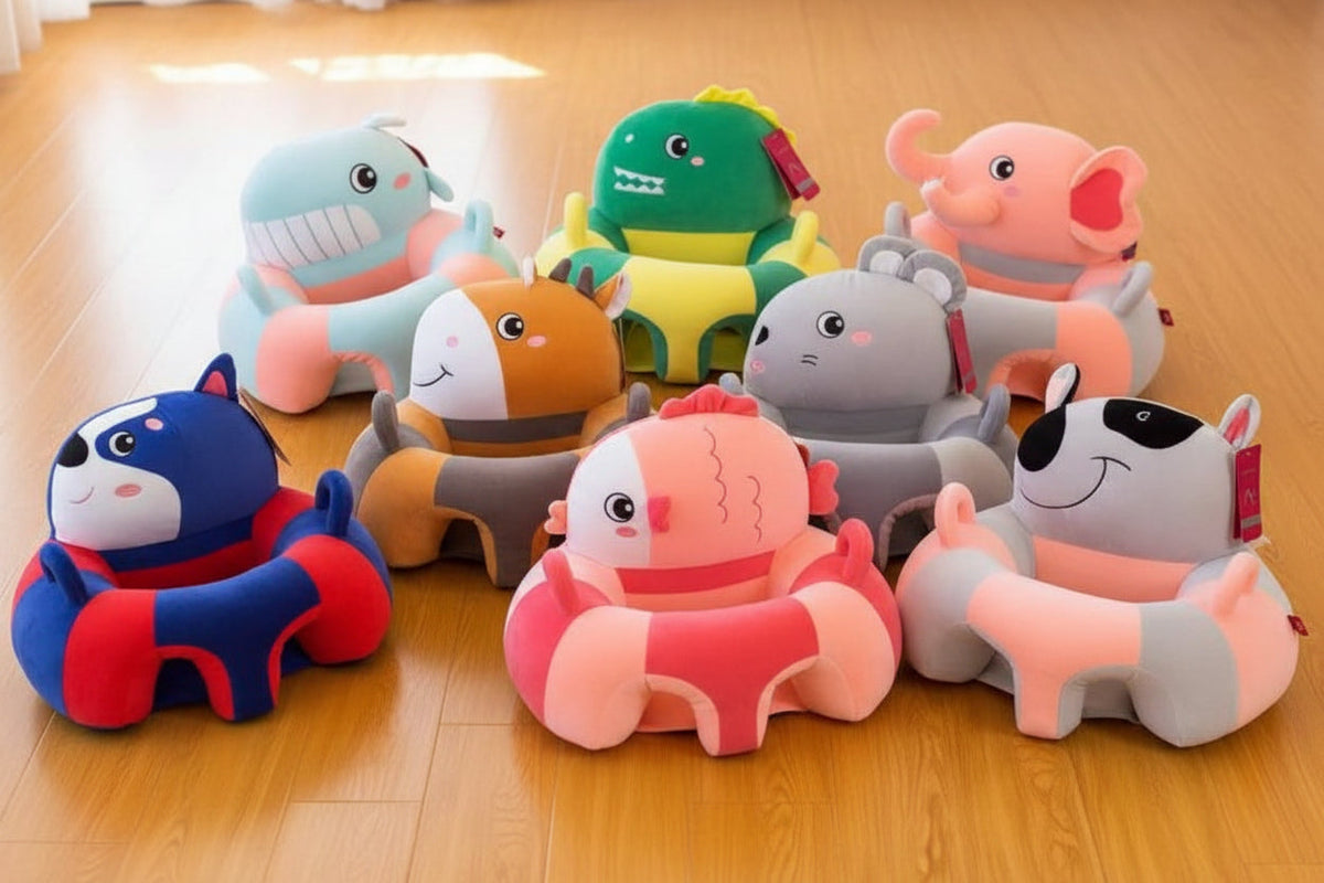 Colorful animal-shaped cushions on a wooden floor