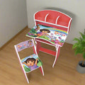 Children's desk and chair set with Dora the Explorer design on a wooden floor.