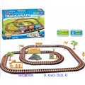 Toy train track set with packaging on a white background