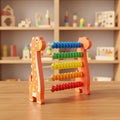 Colorful wooden abacus toy shaped like a giraffe on a wooden surface with shelves of toys in the background.