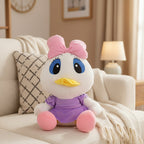 Plush toy resembling a cartoon character with a pink bow on a couch in a living room.