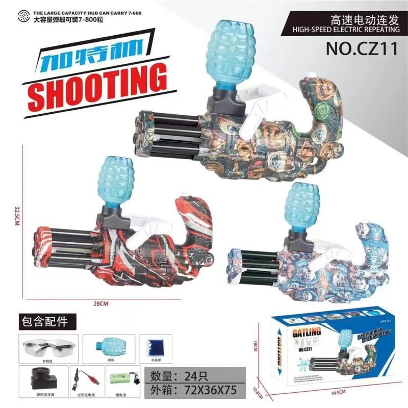 Three handheld electric shooting toy blasters with colorful printed patterns and blue grenade-shaped nozzles, shown on a white background with Chinese text, dimensions, included accessories, and the product box.