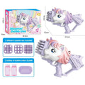 A unicorn-themed bubble gun toy shown with its retail box, plus three nozzle attachments and two bubble water bottles. The product is primarily light purple/lavender with a white face and pastel pink hair accents.