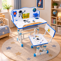 A children's adjustable desk and matching chair set with a space theme, featuring astronaut illustrations, a moon graphic, and blue trim, shown in a decorated children's bedroom.