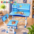 A children's desk and chair set by Kiddora land, decorated with cartoon graphics including a dog pilot and a red airplane. The set features a blue desk with white legs, a matching chair, and a backrest panel with colorful stickers and a progress bar, set in a child's bedroom.