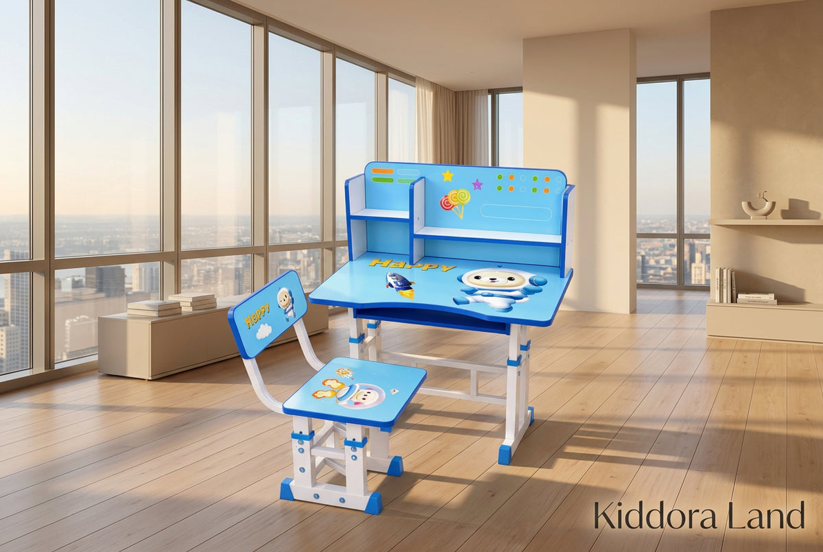 A children's desk and chair set by BabyLand, decorated with cartoon astronaut and space-themed graphics. The set includes a blue and white adjustable desk with a built-in shelf, a matching chair, and a small storage box, set in a bright, child-friendly room.