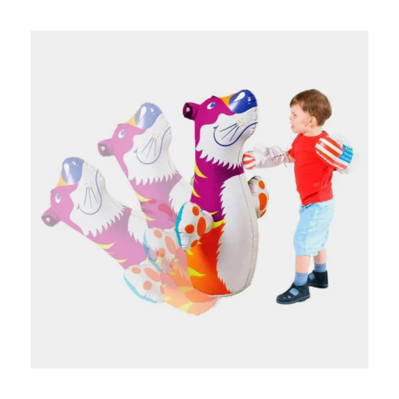 Child playing with a colorful inflatable dragon toy on a white background